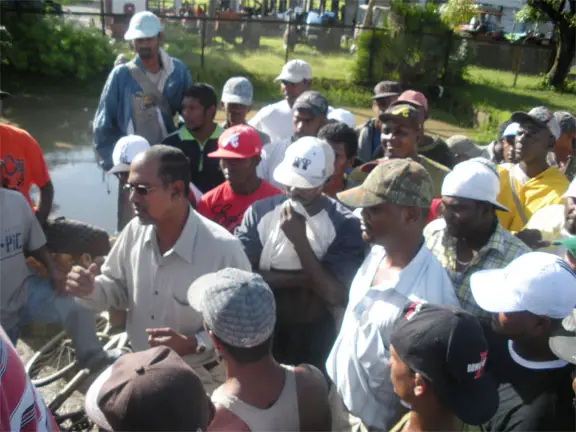 Striking sugar workers at Albion yesterday