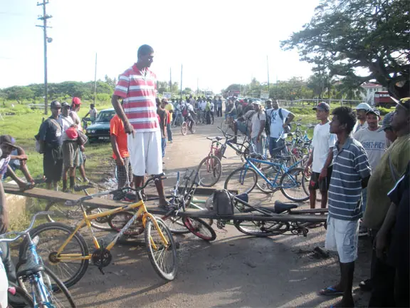 Bicycles and wooden planks used to block the entrance to the factory