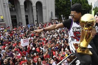 Warriors celebrate championship with parade, champagne and ice