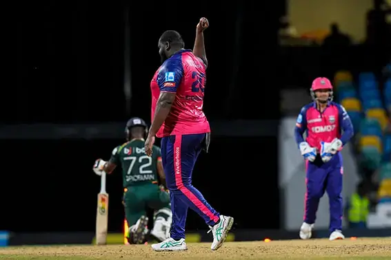 Rahkeem Cornwall
celebrates after
dismissing Andre Fletcher (CPL Photo).