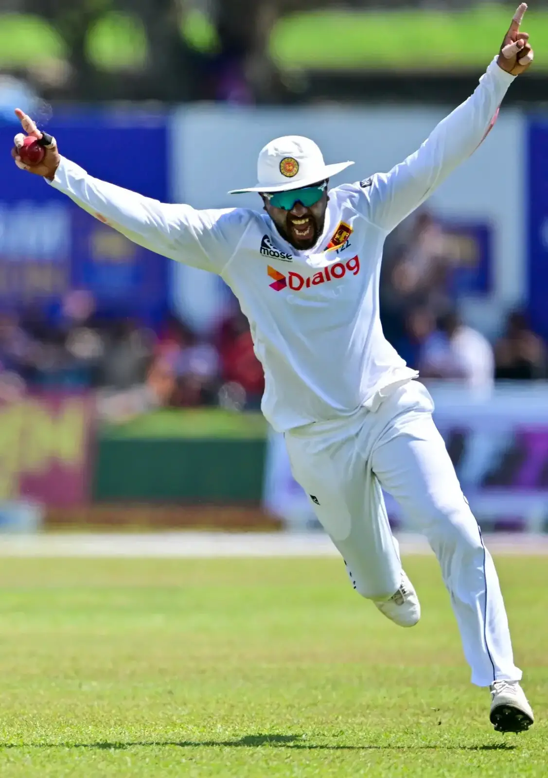 Dinesh Chandimal celebrates after taking a sharp catch to dismiss Devon Conway for 61 (ESPN Cricinfo Photo)