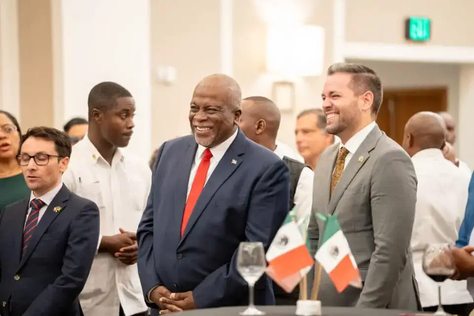 Mexican Ambassador to Guyana, Mauricio Vizcaíno Crespo  (right) and Prime Minister Mark Phillips (second from right) at the Mexican national day event. (Office of the Prime Minister photo)