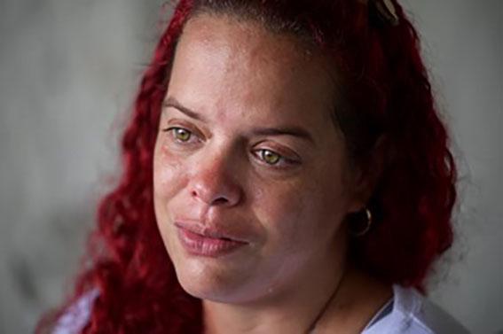 Dennys Benitez reacts while speaking about her 17-year-old son Luis David Lopez Benitez, who she says was detained while on his way home from shopping for diapers for his child, as protests challenging the election results were taking place, in Valencia, Venezuela, October 8, 2024.