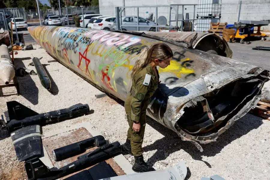 An Israeli soldier stands next to the remains of an Emad ballistic missile at Julis army base, October 9 Reutershttps://kathmandupost.com/world/2024/10/13/un-says-israeli-tanks-burst-through-gates-of-peacekeeper-base