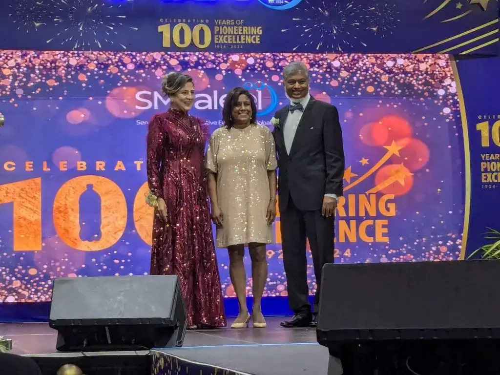 Chairman of SM Jaleel, Dr Aleem Mohammed (right) and his wife Anna (left) with Trade Minister Paula Gopee-Scoon at the company’s 100th Anniversary and Long Service awards ceremony at Achievors Banquet Hall in San Fernando.