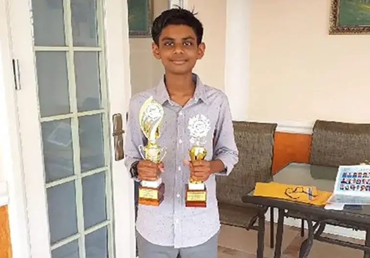 Flashback: Jayden Lalchan displaying trophies he won for academical excellence at St Stephen’s College, Princes Town.