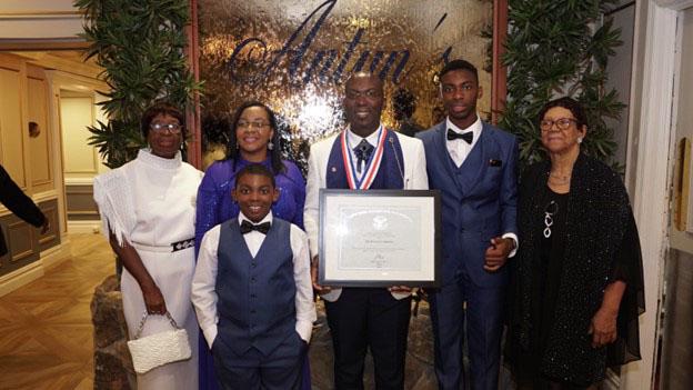 Dr Keith Cummings with his family; flanking him from left are: his mom Florence, wife Shafisha, son Elijah, son Emmanuel and mother-in-law Ingrid.