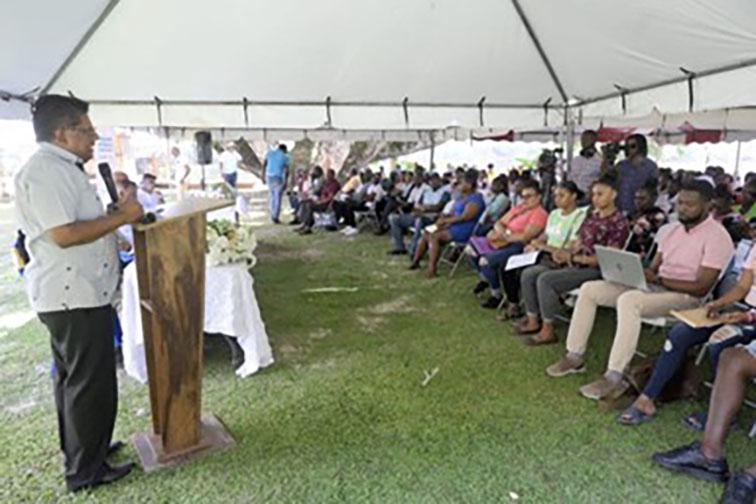 Senior Minister in the Office of the President with Responsibility for Finance and the Public Service, Dr Ashni Singh addressing the gathering at the job fair in Linden, Region Ten