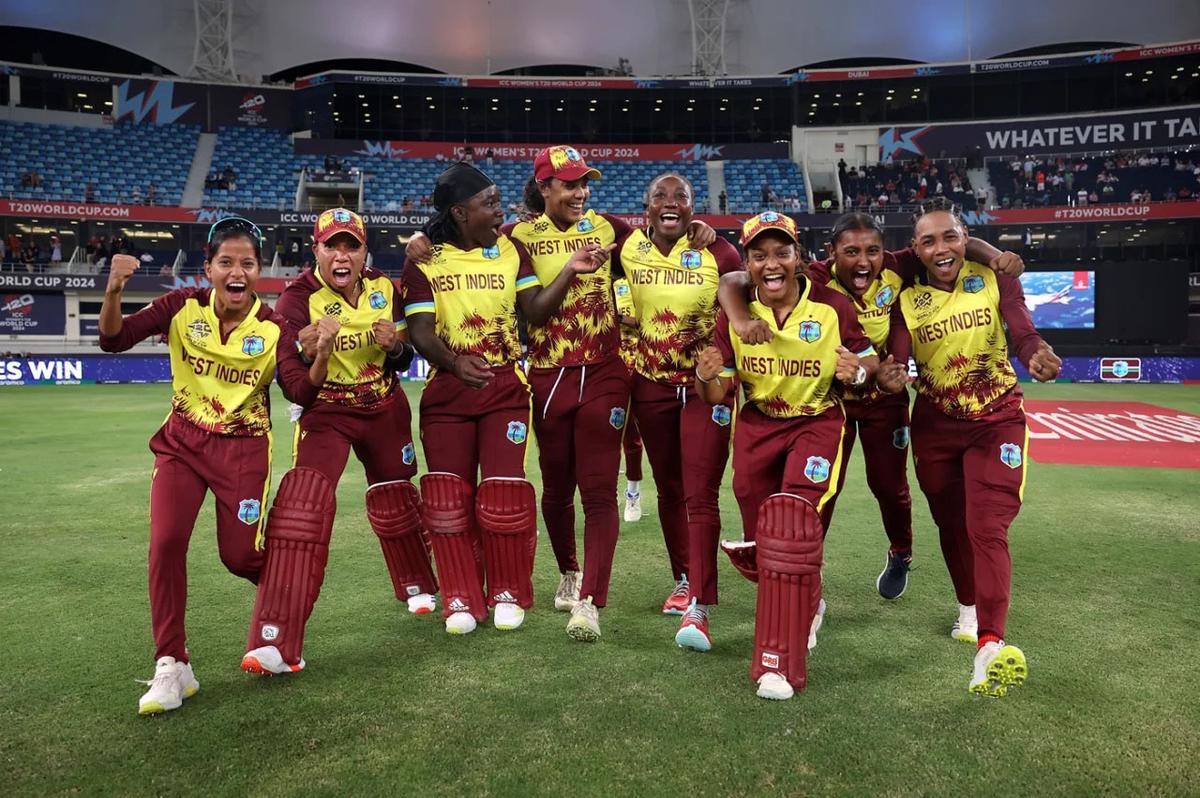 West Indies players celebrate after defeating England to qualify for the semifinal round (ESPN Cricinfo Photo)