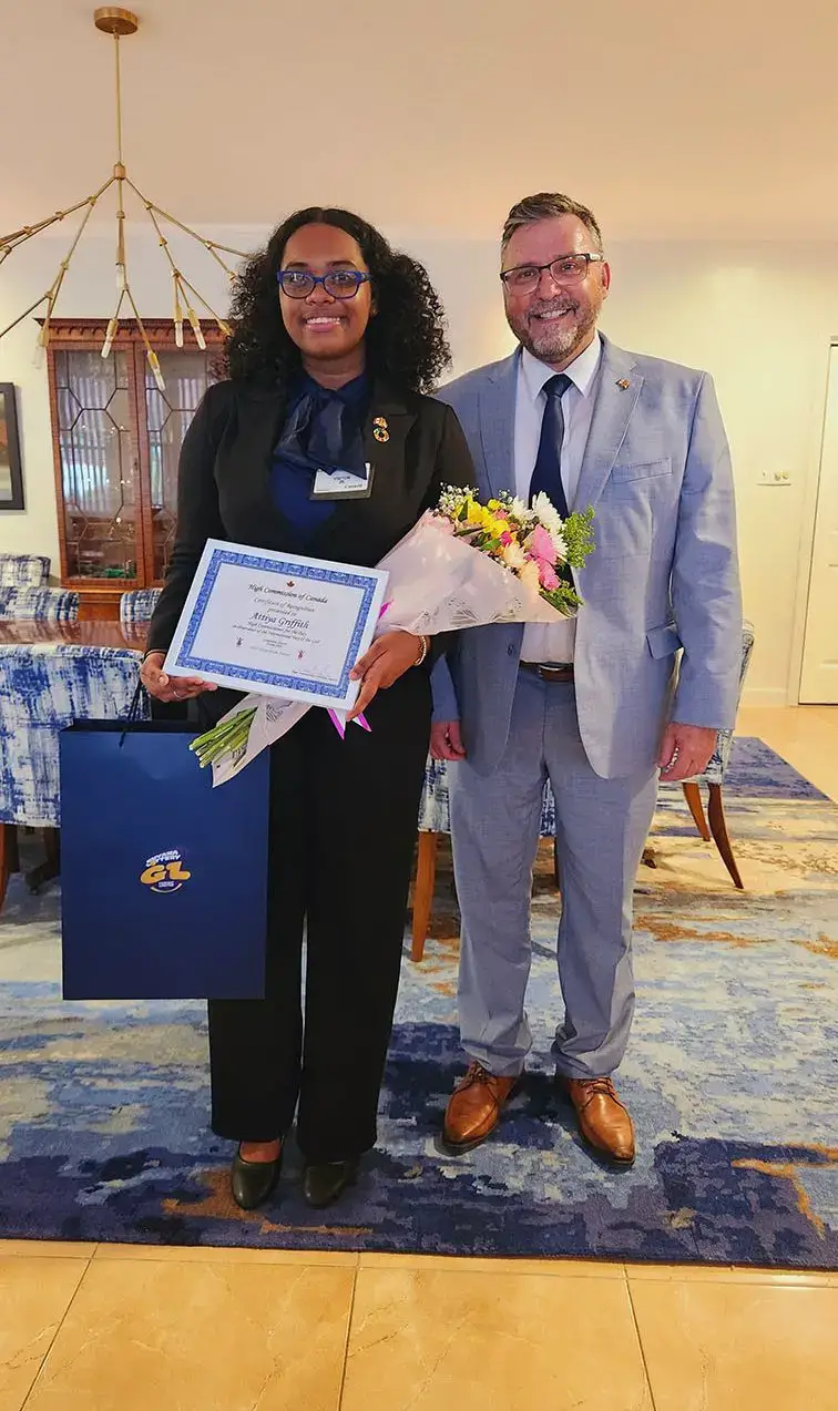 Attiya Griffith (left) with Canada’s High Commissioner to Guyana Sébastien Sigouin (Canadian High Commission photo)