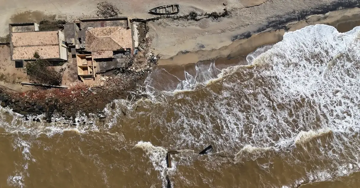 A drone view shows a destroyed house on the beach in Atafona, Rio de Janeiro state, Brazil, September 16, 2024. REUTERS/Ricardo Moraes