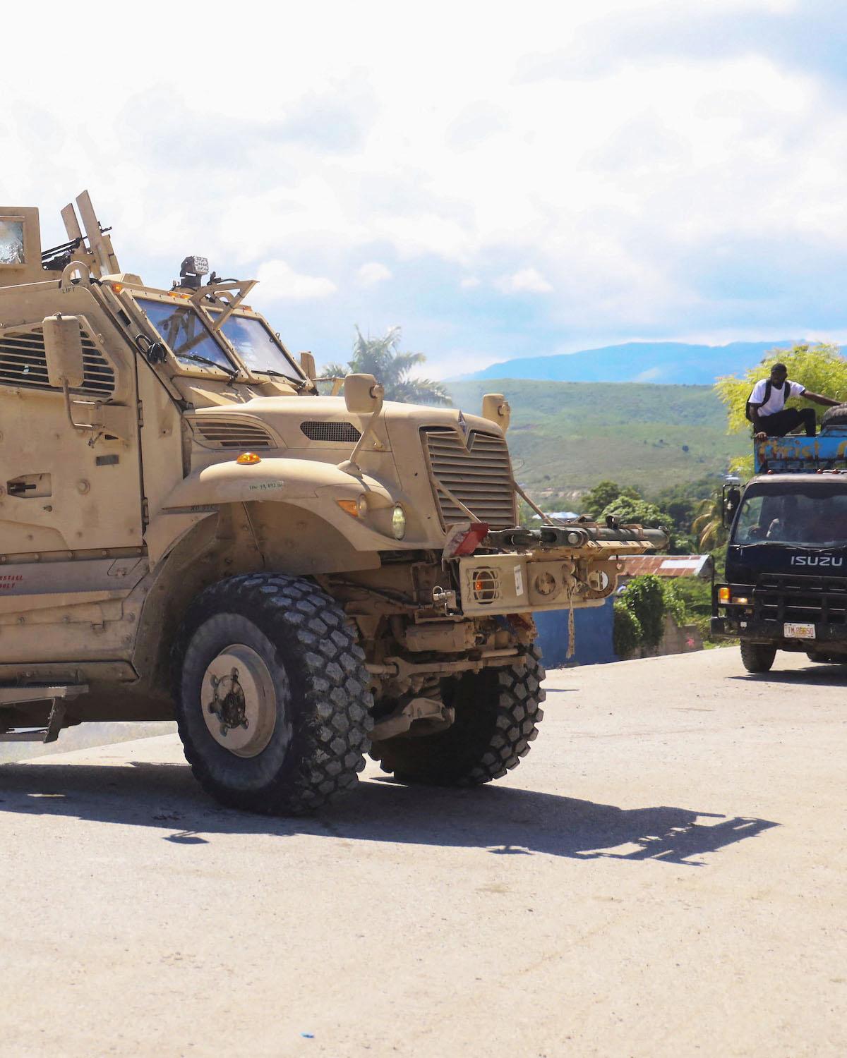 An armoured vehicle is driven out of a police station following the October 3 attack by members of the Gran Grif gang in Pont-Sonde that left several people dead, in Pont-Sonde, Haiti, October 7, 2024. REUTERS/Marckinson Pierre