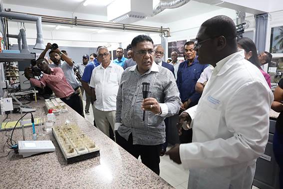 A NAREI official (right) providing an explanation to Minister of Agriculture Zulfikar Mustapha