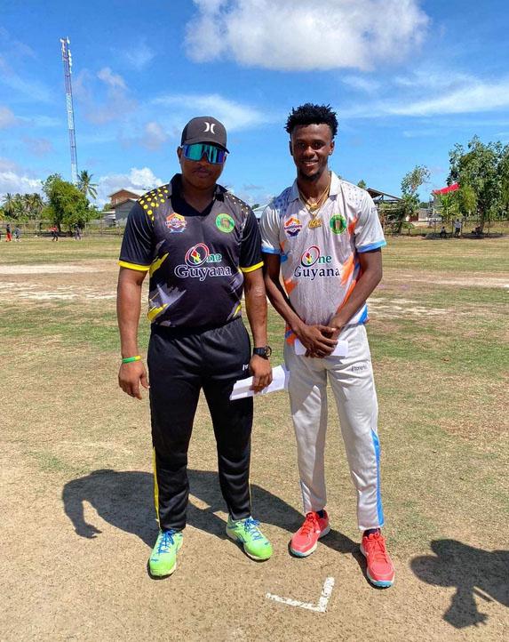 Demerara Pitbulls skipper Christopher Barnwell (left) and his Demerara Hawks counterpart Junior Sinclair posed for a photo opportunity following the conclusion of the coin toss.