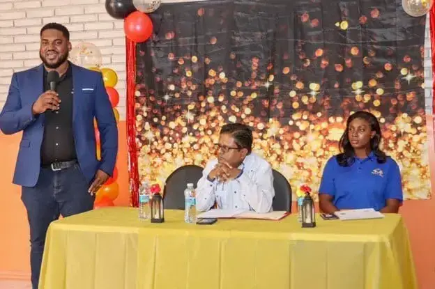 Malcolm Sobers (left) owner of MIDAS BPO and Senior Minister in the Office of the President with responsibility for Finance Dr Ashni Singh (centre).