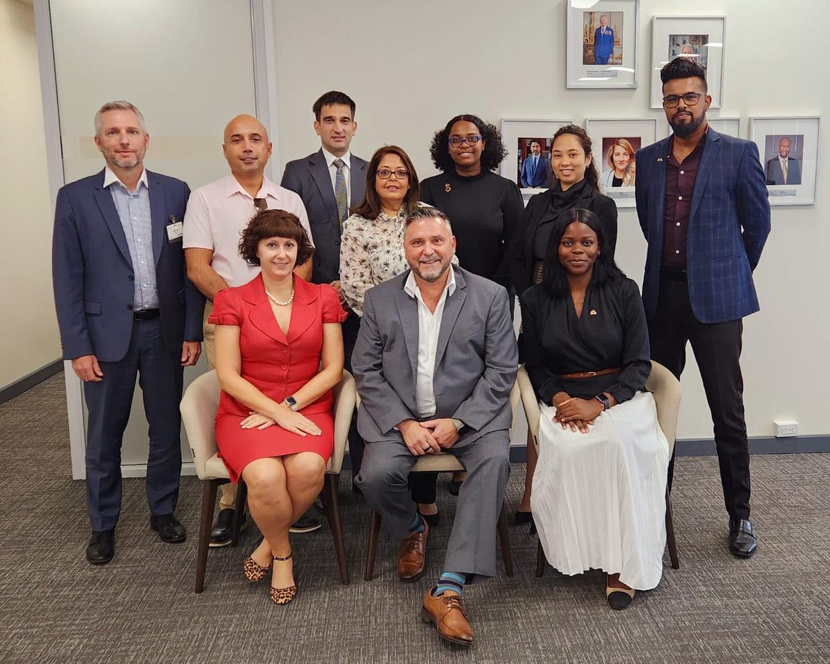 High Commissioner of Canada to Guyana, Sébastien Sigouin (seated at centre) with members of the delegation.  (Canadian High Commission photo)