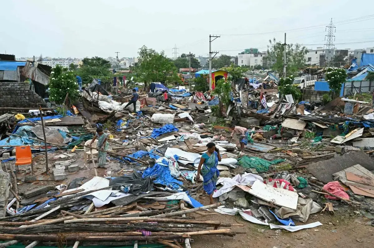 Residents search for their belongings after their houses were demolished by the Hyderabad Disaster Response and Asset Protection Agency (HYDRA) as part of unauthorised construction, in Hyderabad on September 9, 2024. AFP file