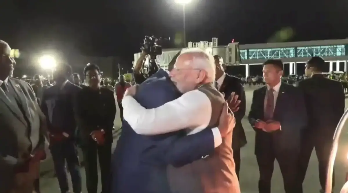 Indian PM Narendra Modi embraced President Irfaan Ali moments  after he deplaned at the Cheddi Jagan International Airport, Timehri. (Screenshot from NCN's feed)