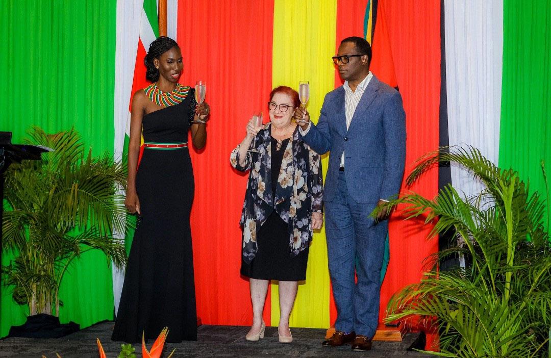 Suriname’s Ambassador  Liselle Blankendal (left) sharing a toast with Minister of Foreign Affairs, Hugh Todd (right) and Minister of Parliamentary Affairs, Gail Teixeira. (Suriname Guyana Chamber of Commerce photo)