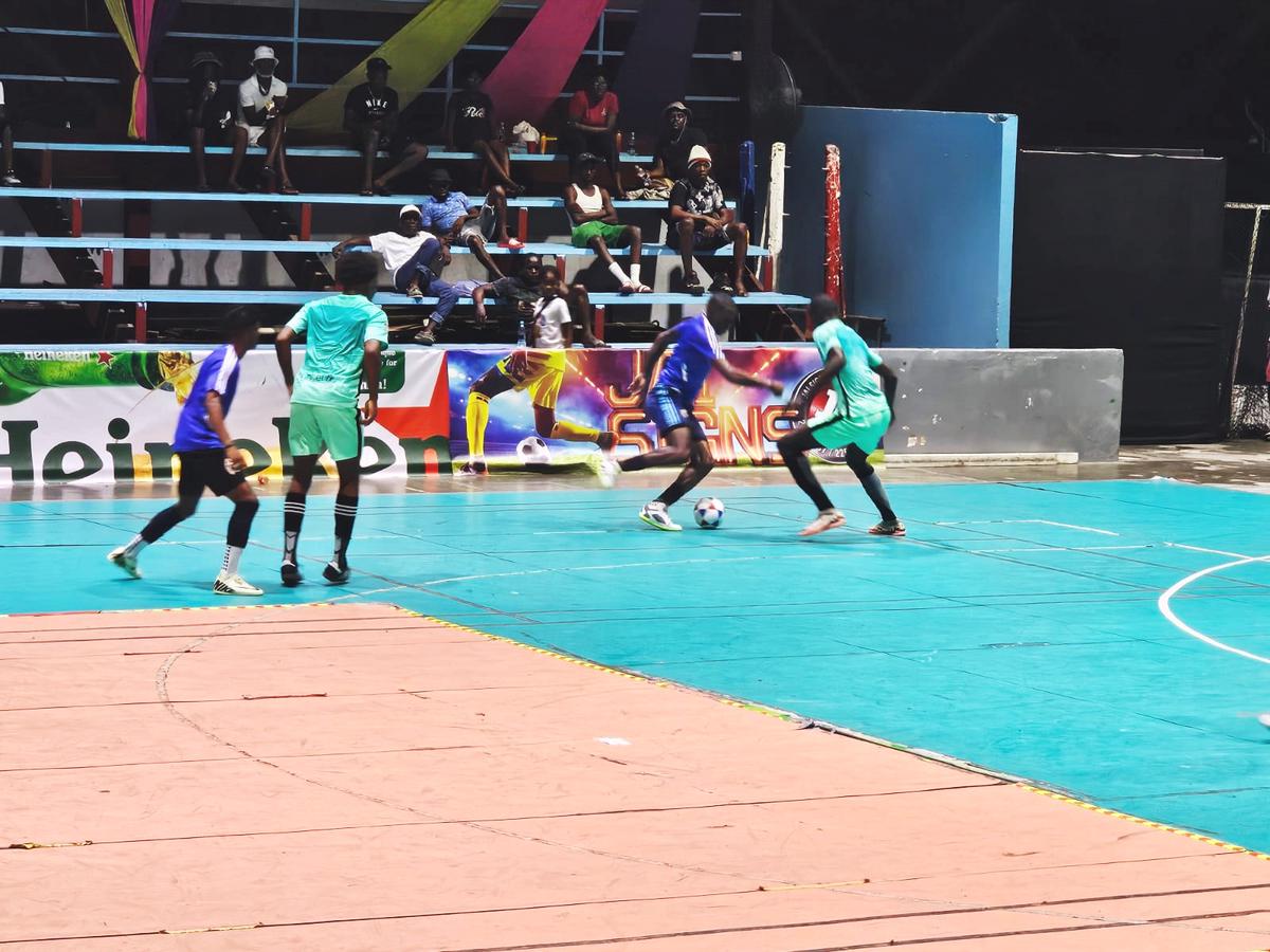 A moment in the Stabroek Ballers (green) and Family match in the Kashif and Shanghai National Futsal Championship.