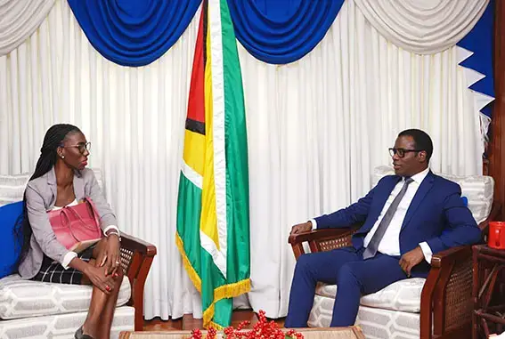 Foreign Minister Hugh Todd (right)  with Suriname Ambassador Liselle Blankendal (Ministry of Foreign Affairs photo)